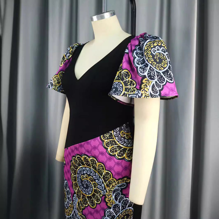 Women's fitted dress with colorful puff sleeves and asymmetrical design StylebySassy
