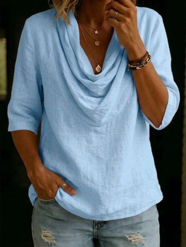 Women's airy linen blouse with draped waterfall collar, loose silhouette, and three-quarter sleeves StylebySassy