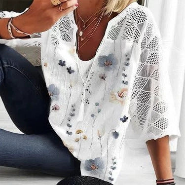 Women's V-neck tunic with lace-knit sleeves and subtle watercolor floral print StylebySassy
