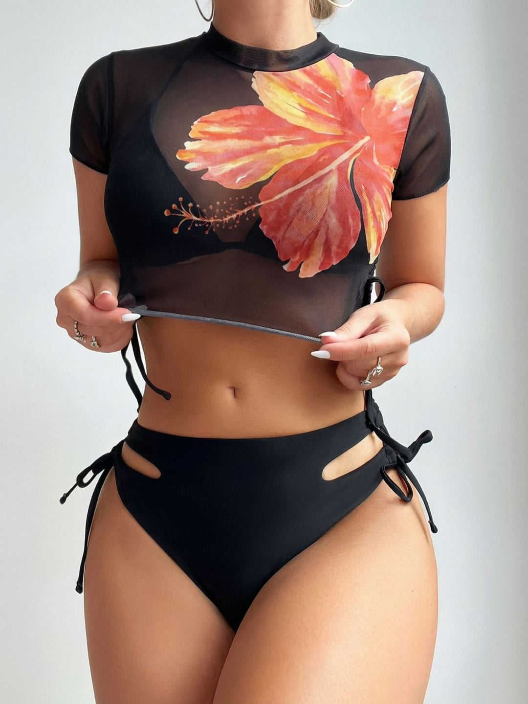 Women's bikini set with asymmetrical top and floral design StylebySassy