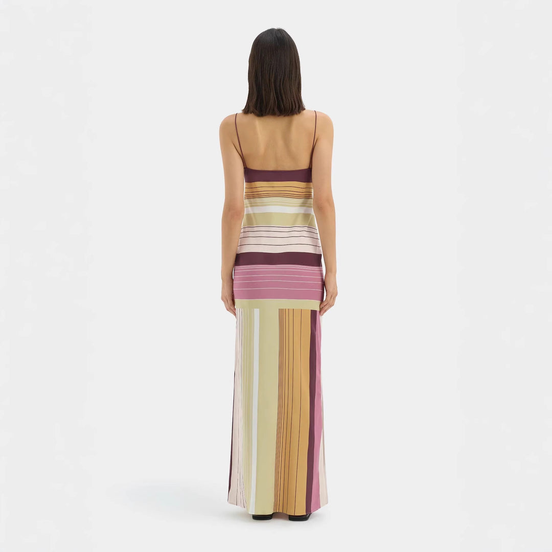 Women's figure-hugging maxi dress with spaghetti straps, straight neckline, panel stripes, and side slit StylebySassy