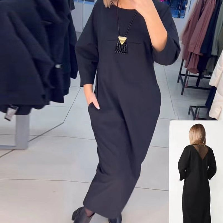 Women's straight maxi dress with ankle-length silhouette, half-length sleeves, side pockets, and transparent V-back StylebySassy