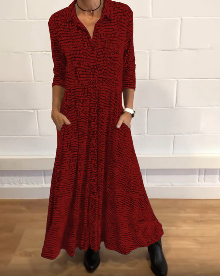 Ladies' flowing maxi dress with shirt collar, half-length sleeves, and side pockets StylebySassy