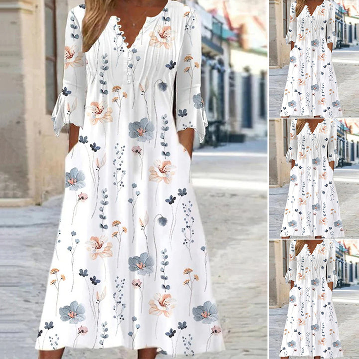 Women flowing midi dress with V-neck, decorative button placket, chest pleats, bow sleeves and side pockets StylebySassy