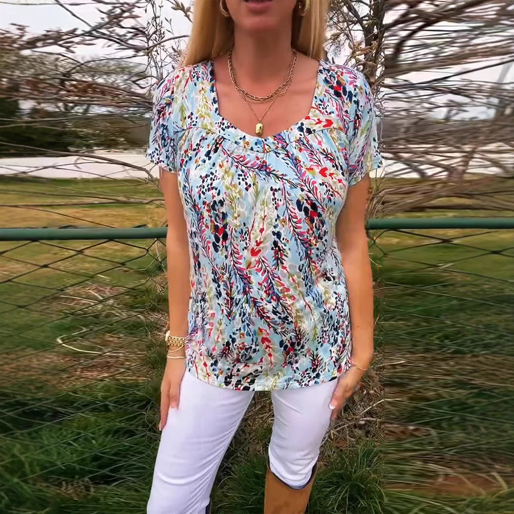 Women's light viscose blouse with boxy yoke, gathered bust section, and short butterfly sleeves StylebySassy