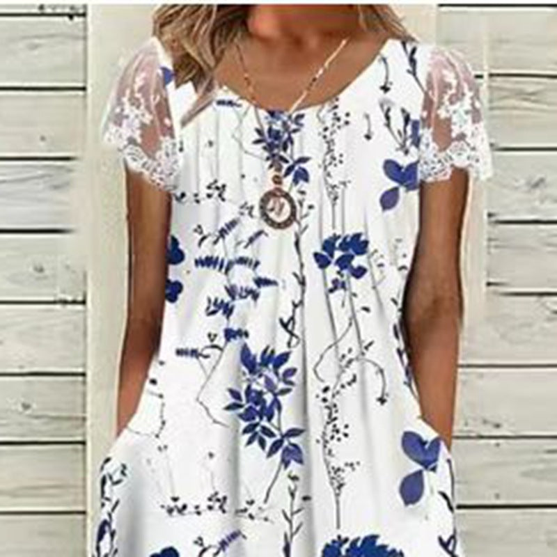 Ladies' airy A-line midi dress with lace sleeves, side pockets, and round neckline StylebySassy