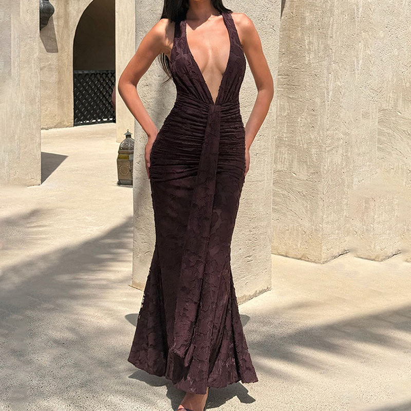 Women Elegant, figure-hugging evening dress with deep V-neck and ruffle details StylebySassy