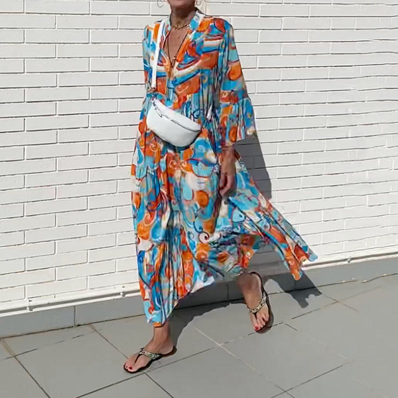 Women's airy maxi dress with watercolor print, V-neck, half button placket and tiered skirt StylebySassy