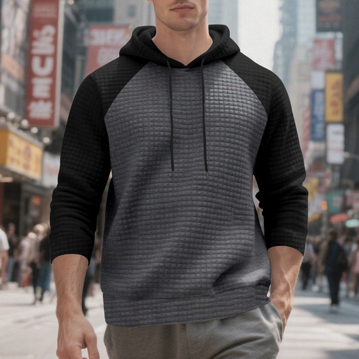 Men's quilted hoodie with raglan sleeves and drawstring StylebySassy