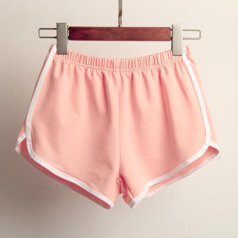 Women's sporty shorts with elastic waistband and contrasting stripes StylebySassy