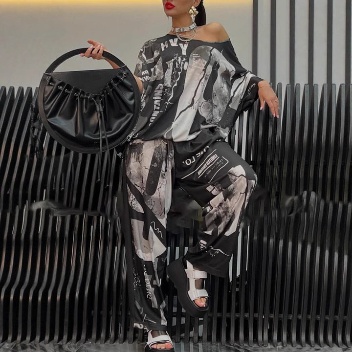 Ladies two-piece wide satin leisure set with off-shoulder batwing top and palazzo pants StylebySassy