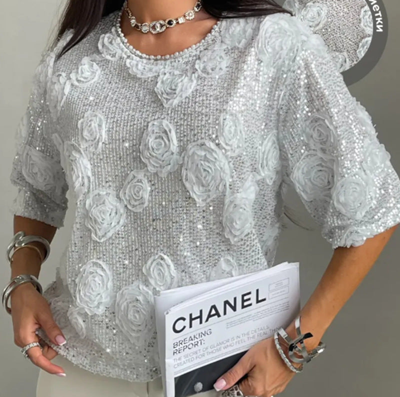 Women nan elegant sequin blouse with three-dimensional rose appliqués, round neckline and half-length sleeves StylebySassy