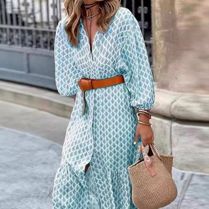 Women's lightweight patterned midi dress with V-neck, button placket, tiered skirt, and balloon sleeves StylebySassy