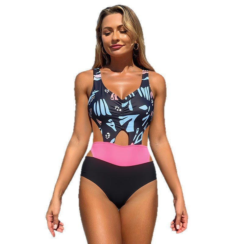 Women's one-piece swimsuit with fashionable cut-out and contrasting accents StylebySassy