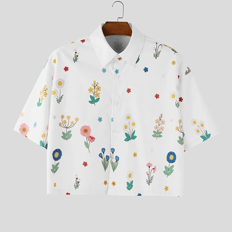 Women's loosely cut short sleeve shirt blouse with floral all-over print, shirt collar and short hem StylebySassy