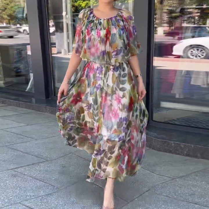 Women’s airy chiffon maxi dress with floral print, gathered round neckline and elastic waistband StylebySassy