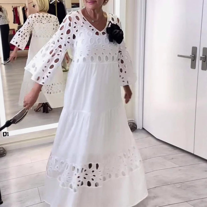 Women's maxi dress with openwork embroidery, V-neck, wide bell sleeves, and tiered hem StylebySassy
