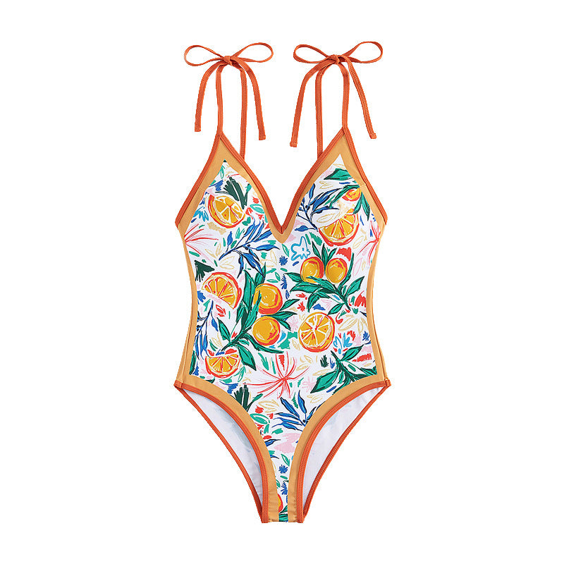 Women's swimsuit with vibrant plant and fruit motif StylebySassy