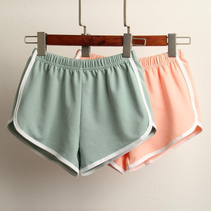 Women's sporty shorts with elastic waistband and contrasting stripes StylebySassy