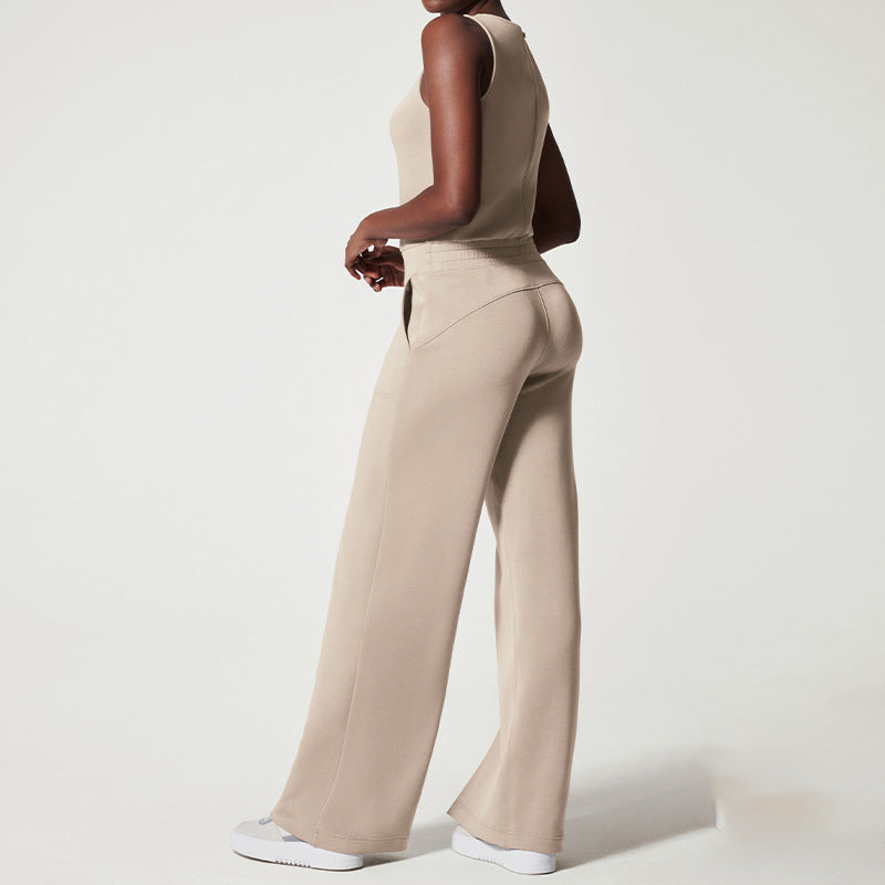 Women's sleeveless knitted jumpsuit with wide palazzo legs, drawstring waistband, and patch pockets StylebySassy