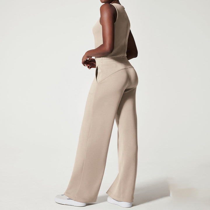 Women's sleeveless knitted jumpsuit with wide palazzo legs, drawstring waistband, and patch pockets StylebySassy