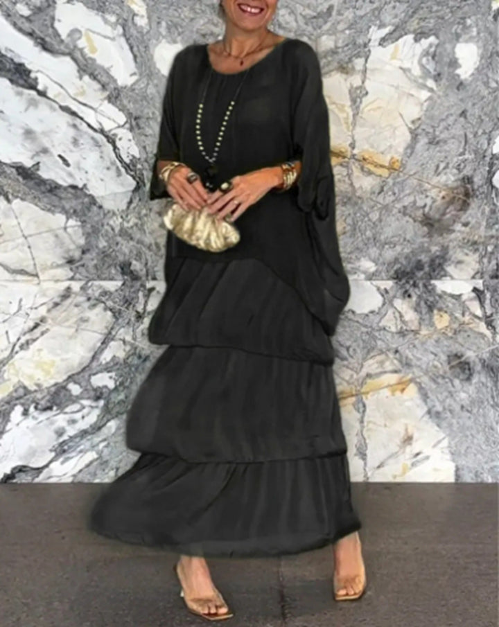 Women's layered tiered maxi dress with wide batwing top and tiered ruffle skirt StylebySassy