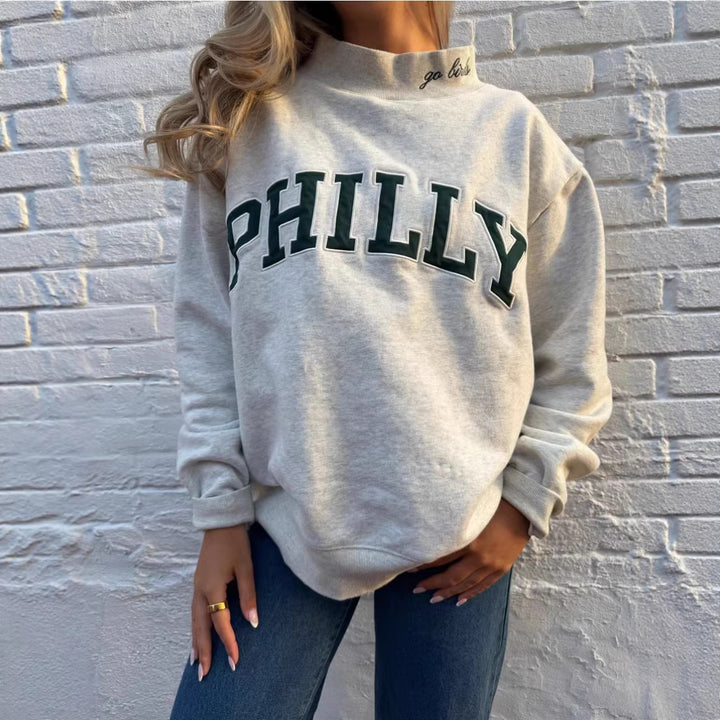 Women's oversized college sweatshirt with high stand-up collar and sewn-on lettering StylebySassy