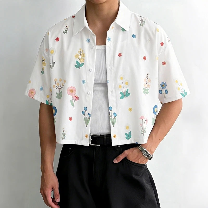 Women's loosely cut short sleeve shirt blouse with floral all-over print, shirt collar and short hem StylebySassy