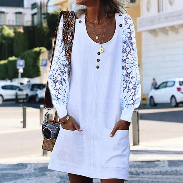 Women's relaxed linen mini dress with floral crochet sleeves, U-neckline and patch pockets StylebySassy