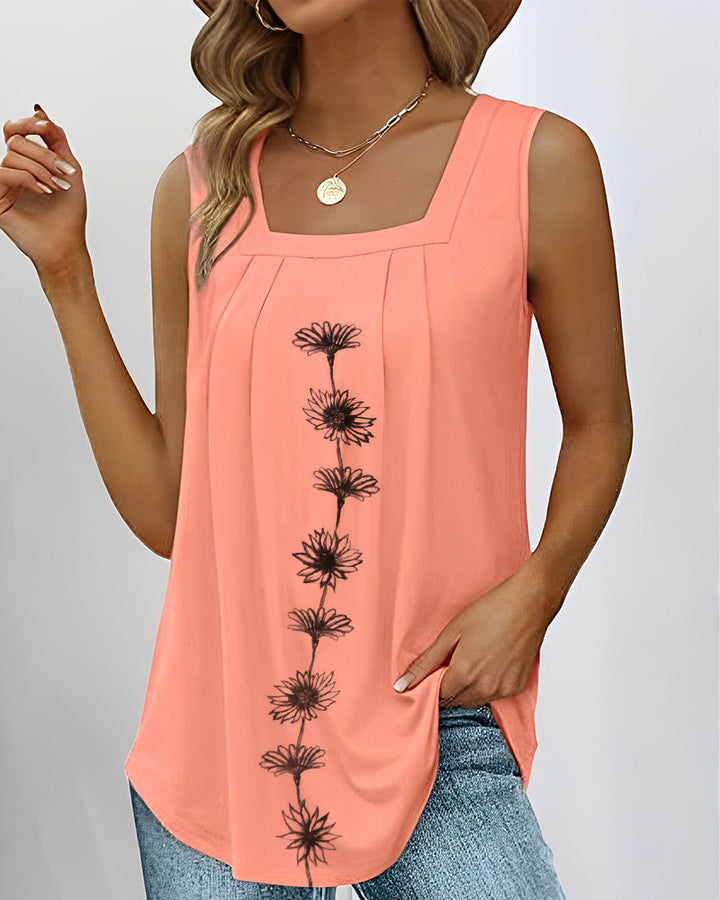 Women's sleeveless long top with square neckline, pleated yoke and central floral print StylebySassy