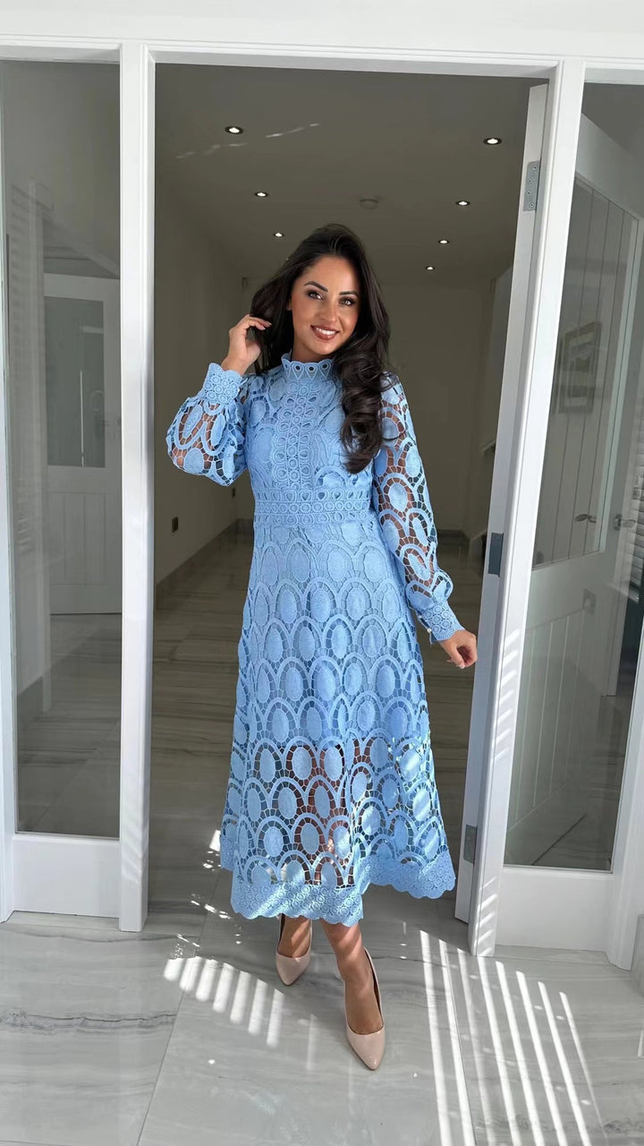 Women's crocheted midi dress with stand-up collar, transparent lace sleeves, and fitted A-line StylebySassy