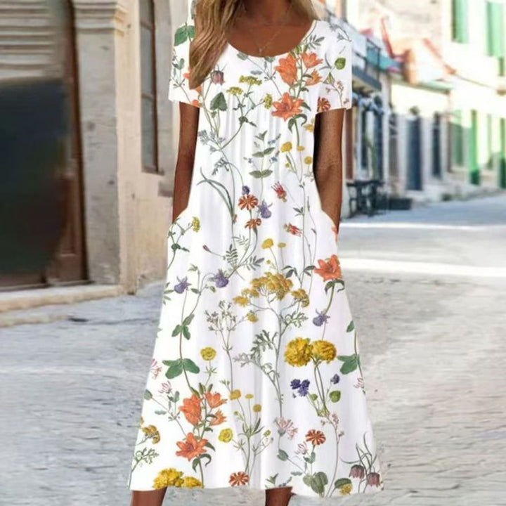 Women's summer A-line maxi dress with V-neck, short sleeves, and side pockets made of lightweight jersey StylebySassy