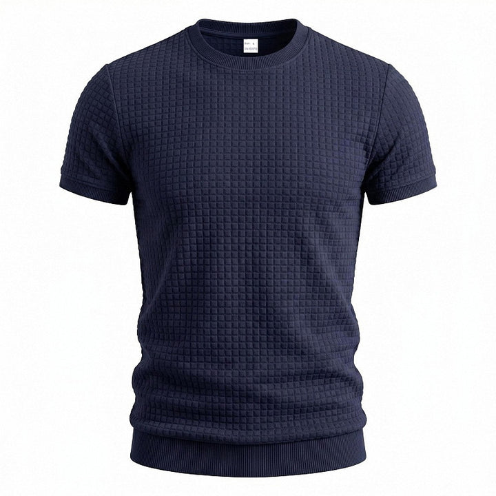 Men's short-sleeved knit shirt with embossed check structure, round neckline, and ribbed hem StylebySassy