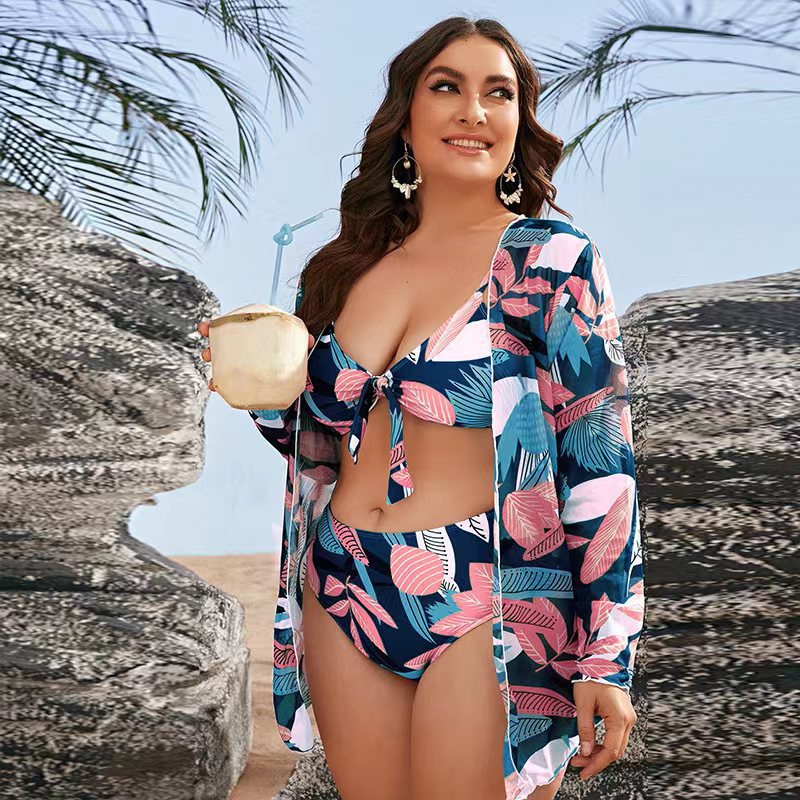 Women's bikini set with floral wrap top and elegant beach jacket StylebySassy