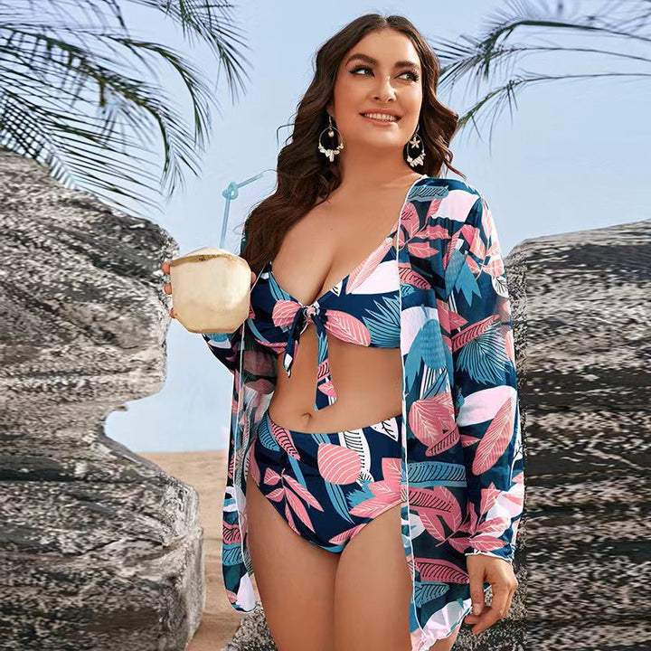 Women's bikini set with floral wrap top and elegant beach jacket StylebySassy