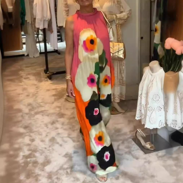 Women's sleeveless maxi dress with ruffled high collar, wide palazzo cut, and large floral print StylebySassy