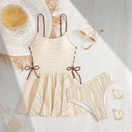 Women’s swimsuit with swinging skirt and adjustable tie system StylebySassy