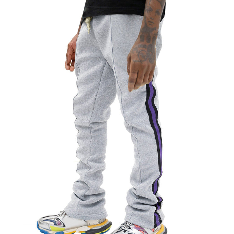 Men's slim-fit casual pants with drawstring, decorative seams, and side contrast stripe StylebySassy
