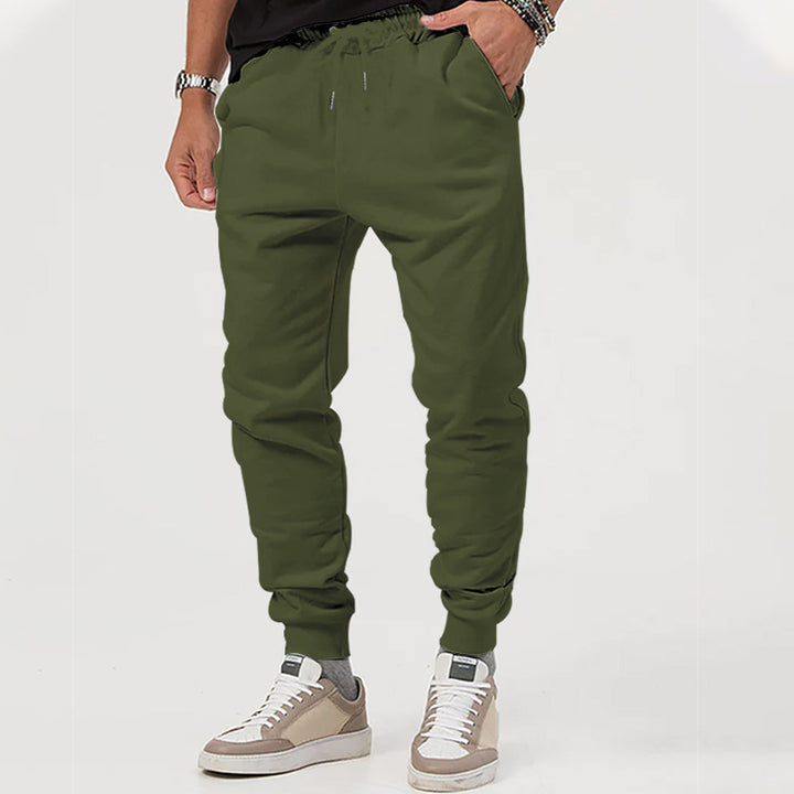 Men's jersey sweatpants in a tapered cut with concealed drawstring and shape-stable ankle cuffs StylebySassy