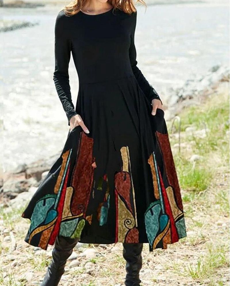 Women's A-line midi dress with abstract spray pattern, round neckline, long sleeves and side pockets StylebySassy