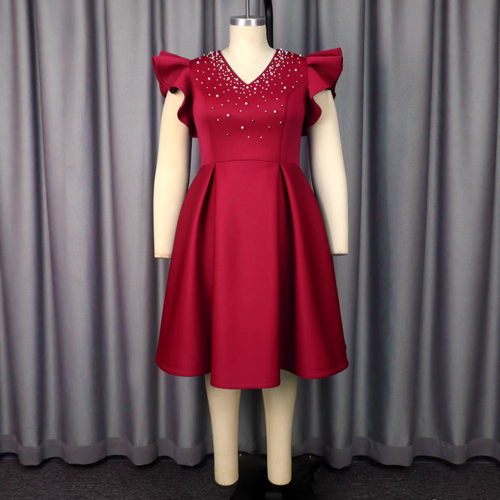 Women A-Line dress with shimmering pearls and voluminous sleeves StylebySassy