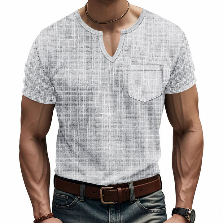 Men's short-sleeve shirt with V-slit neckline and patch chest pocket made of textured jersey StylebySassy