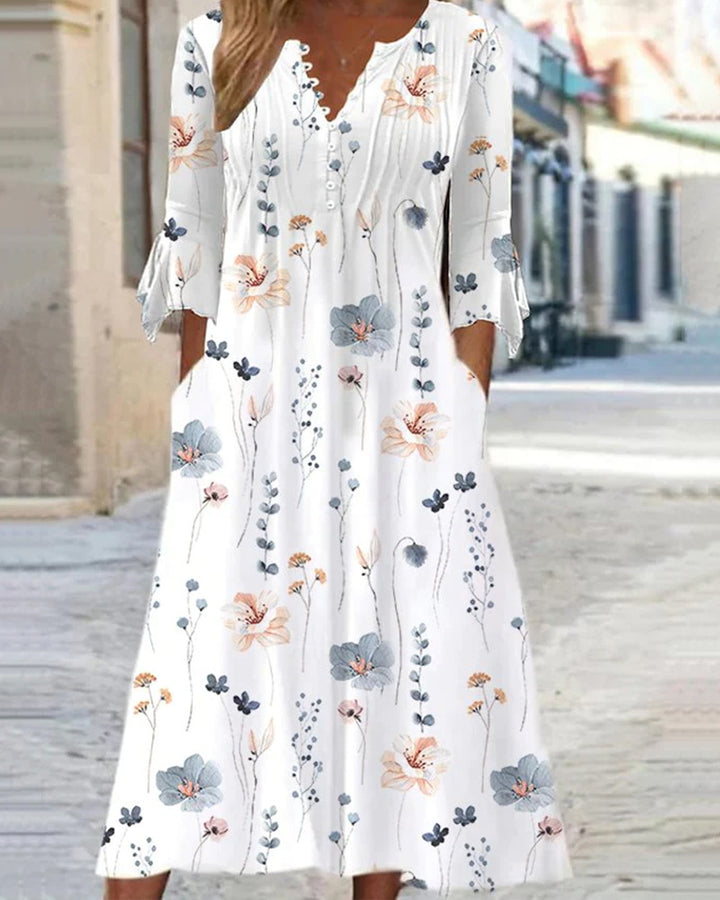 Women's flowing maxi dress with V-neck, chest yoke, ruffled sleeves and pockets StylebySassy