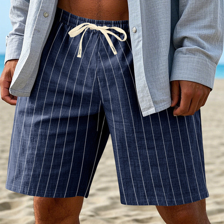 Men's relaxed beach Bermuda shorts with fine pinstripe structure, elastic drawstring waistband, and side slip pockets StylebySassy