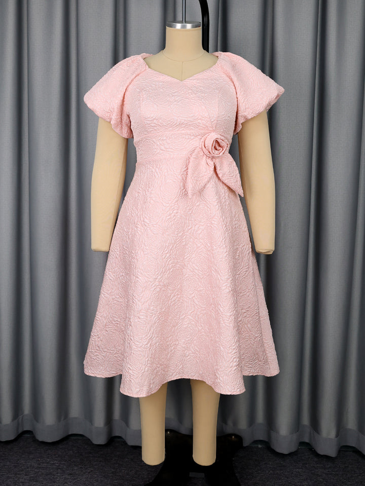 Ladies elegant dress with peplum, floral applique and puff sleeves StylebySassy