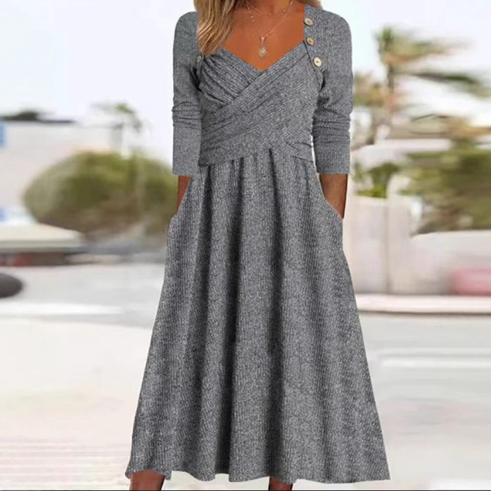 Women's knitted maxi dress with wrap top V-neck, side pockets and decorative button placket StylebySassy