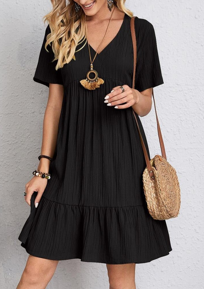 Women nan Crinkle summer dress with V-neck, empire seam and ruffle hem StylebySassy