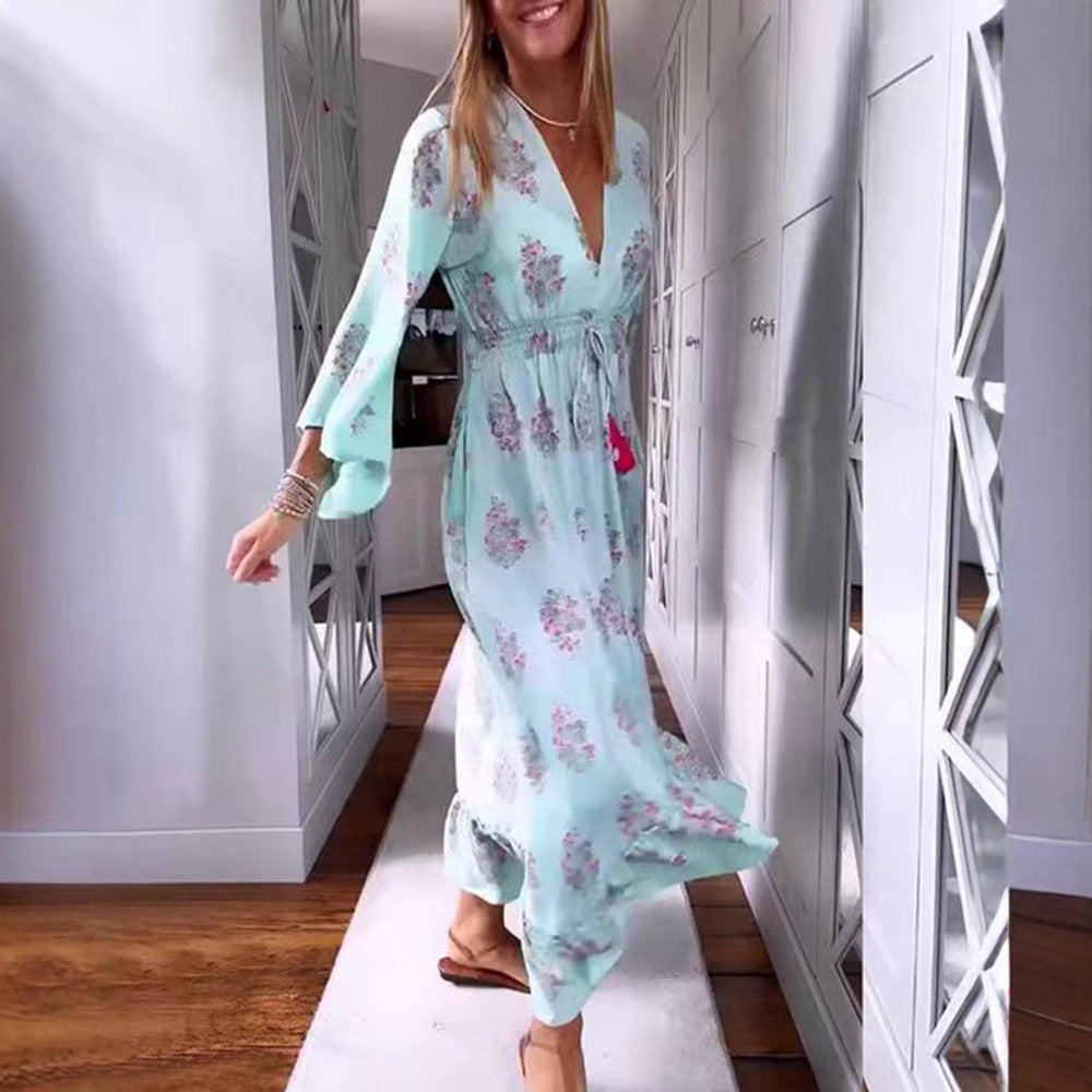 Women’s airy-flowing Boho midi dress with V-neck, gathered smock waist, drawstring with tassels, and asymmetrical ruffled hem StylebySassy