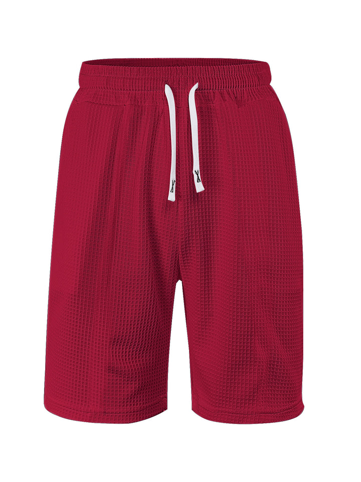 Men's breathable waffle pajama shorts with elastic comfort waistband, drawstring, and side pockets StylebySassy