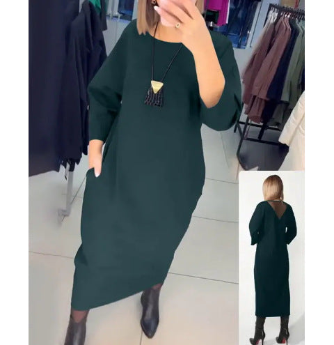 Women's straight maxi dress with ankle-length silhouette, half-length sleeves, side pockets, and transparent V-back StylebySassy